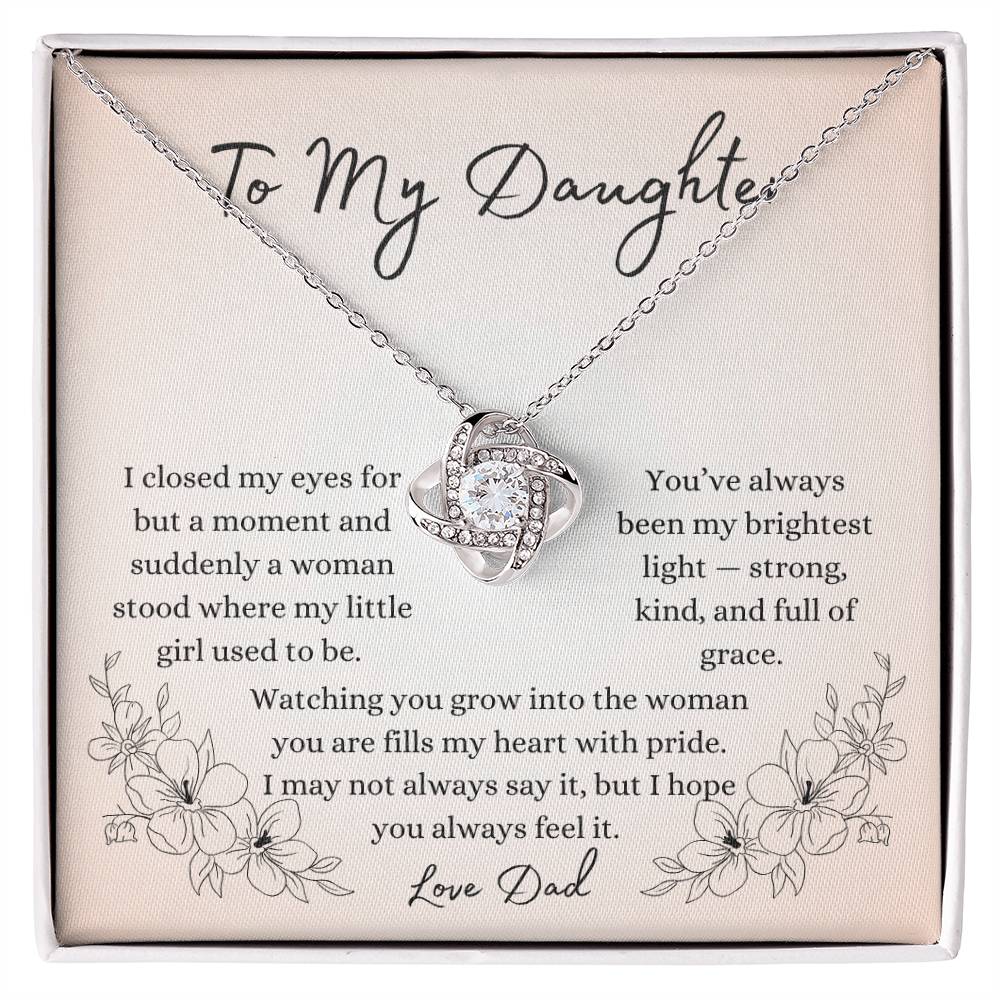 To My Daughter” necklace from Dad with love and pride message card, featuring intertwined pendant symbolizing strength, grace, and everlasting bond.